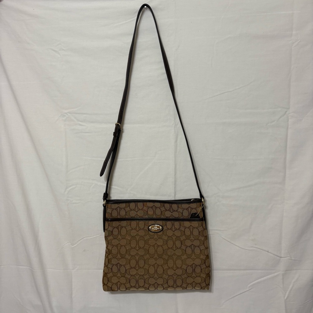 Coach Signature File Bag handbag in brown canvas with a two-tone pattern